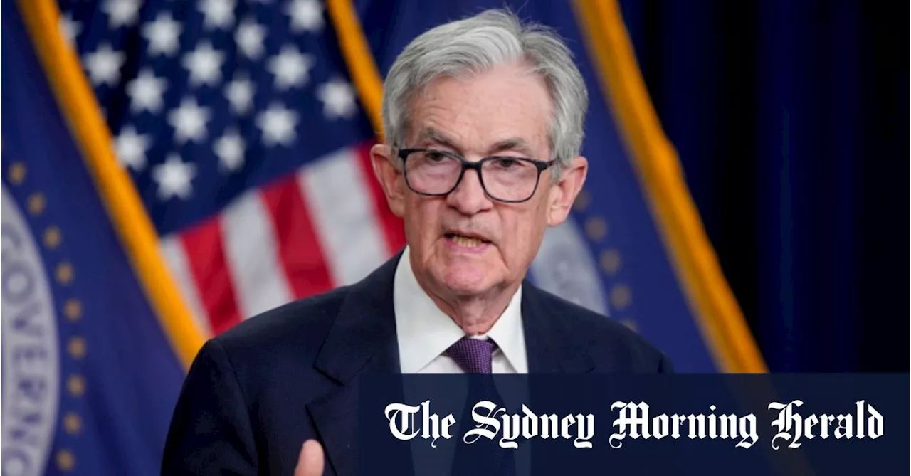 Fed keeps rates on hold, drops key reference to inflation ‘progress’