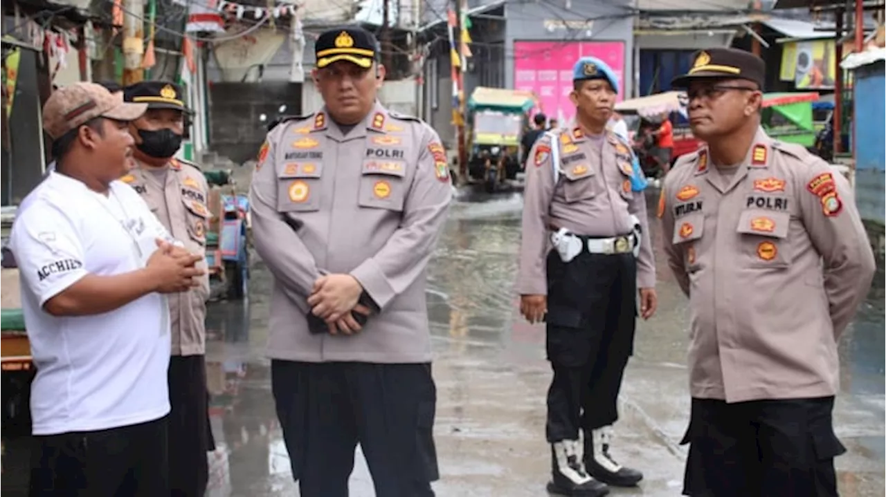 AKBP Martuasah Beri Bantuan ke Warga Terdampak Banjir di Muara Angke