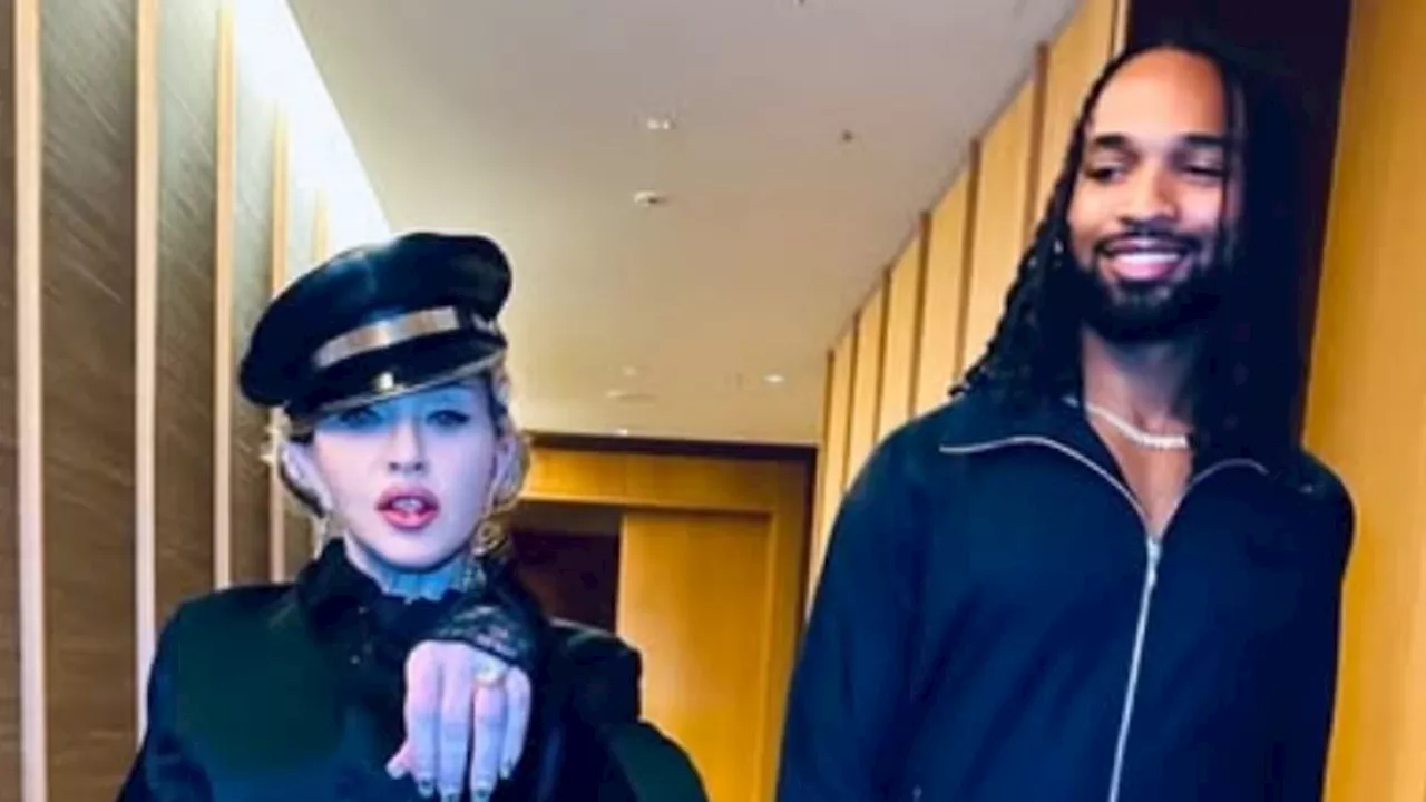 Madonna, 66, fuels engagement rumors with Akeem Morris, 28, while flashing diamond ring on THAT...