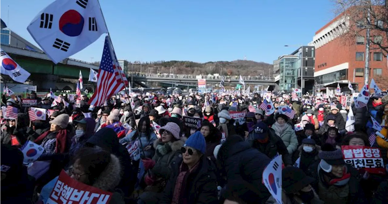 Impeached South Korean President Defies Detention Order in Standoff