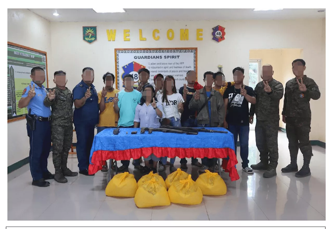 14 communist rebels surrender in Bukidnon