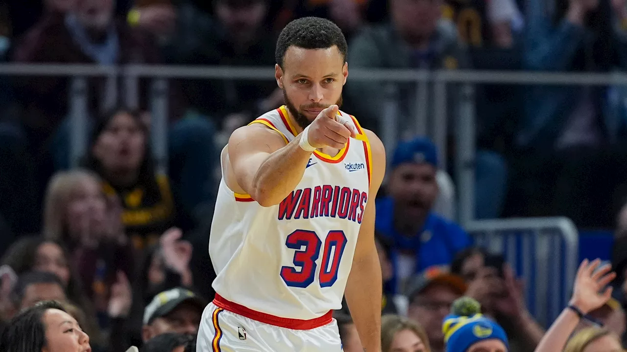 Curry Leads Warriors to Dominant Win Over Embiid's 76ers