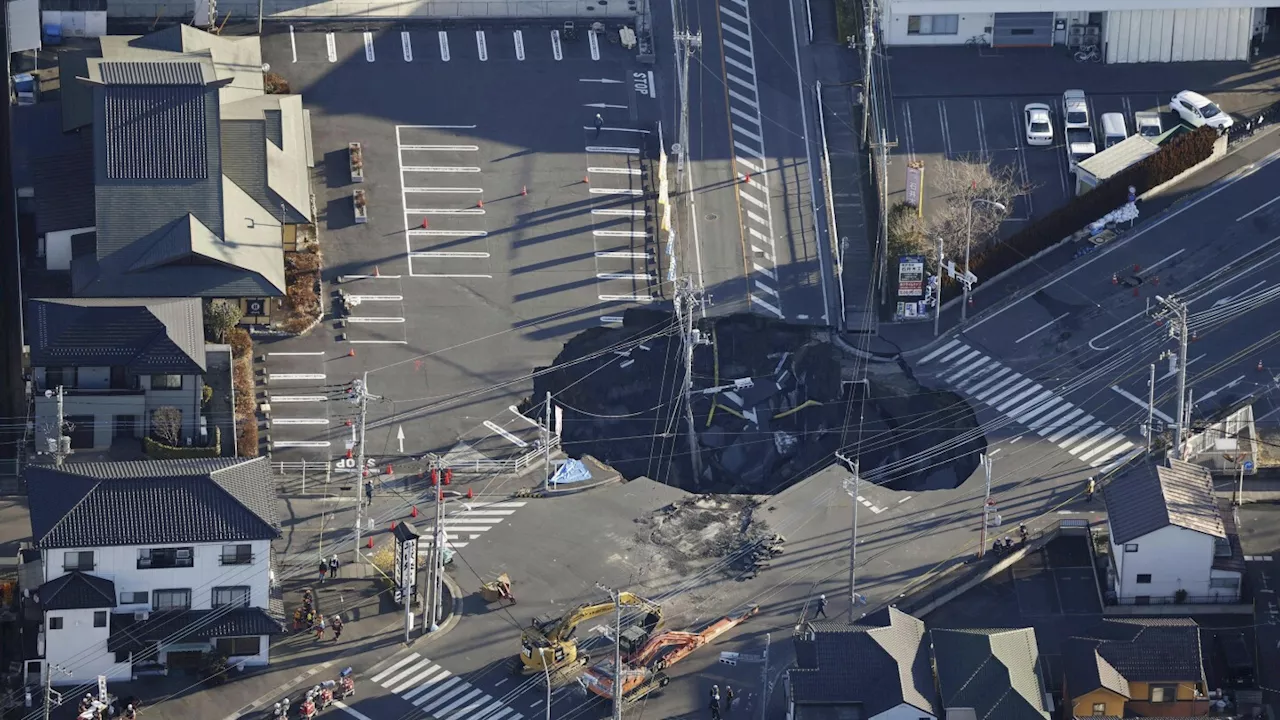 Rescue Efforts Continue for Driver Trapped in Sinkhole Near Tokyo