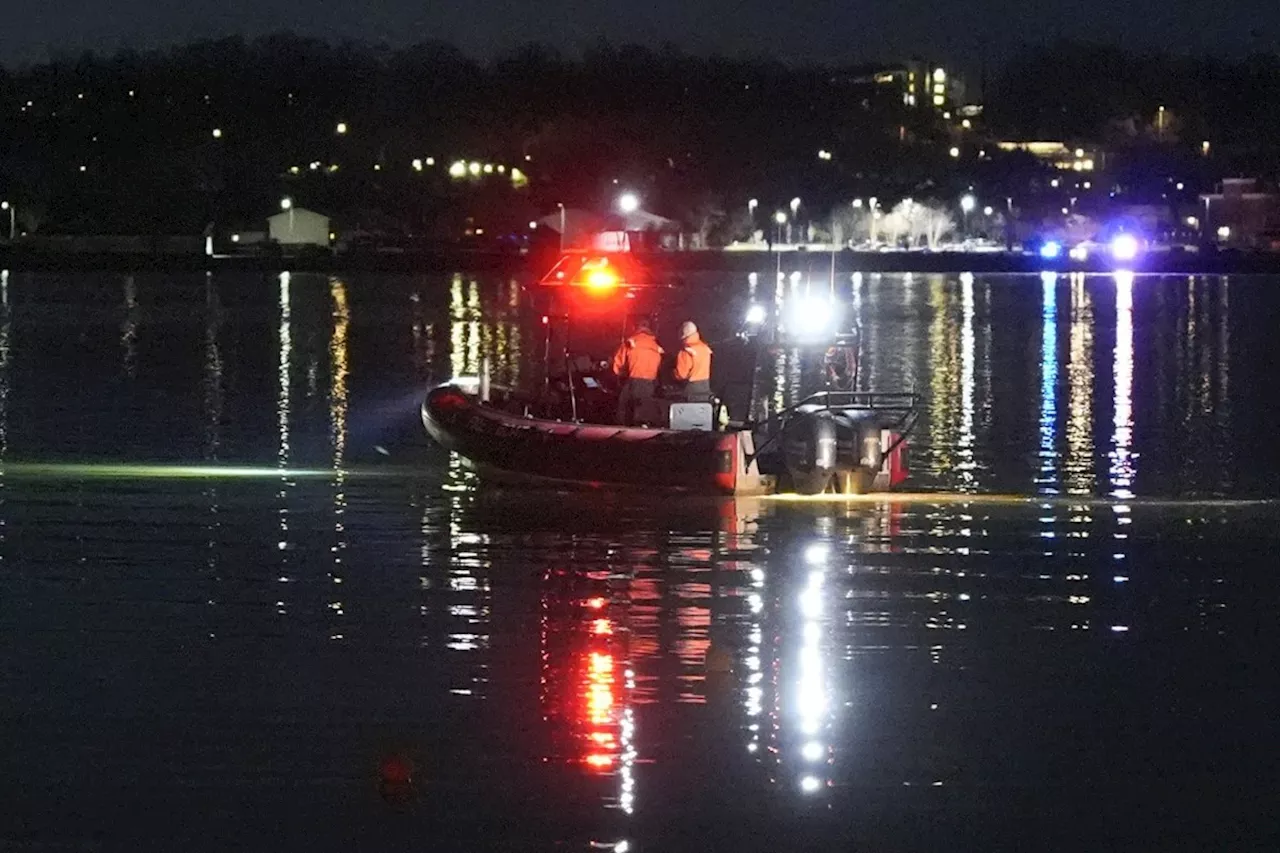 Passenger jet with 64 aboard collides with Army helicopter while landing at Reagan Airport near DC