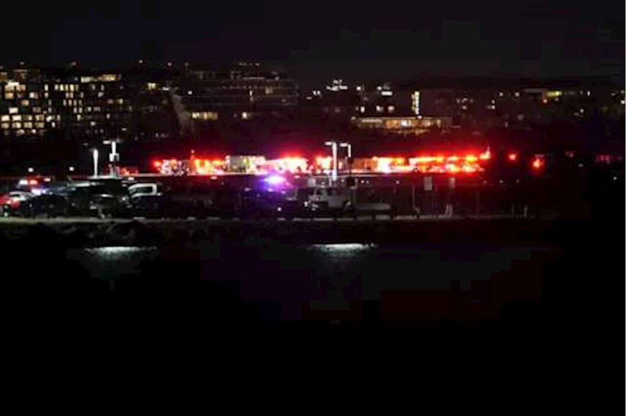 Passenger jet collides with helicopter while landing at Reagan Washington National Airport, FAA says