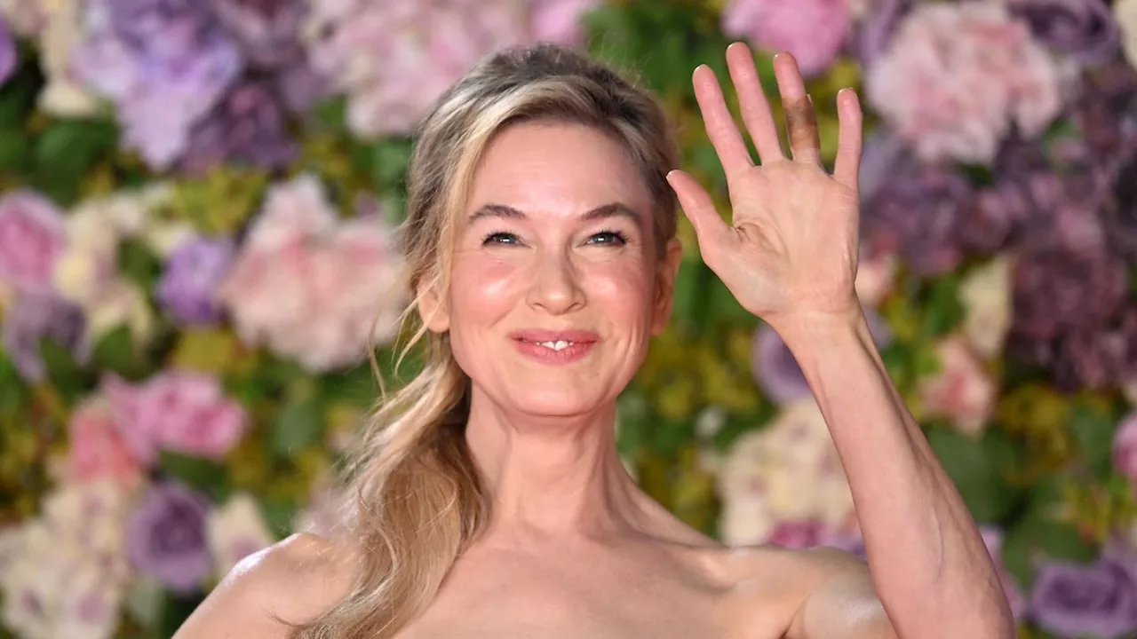 Renée Zellweger: Sie glänzt in pinker Satinrobe – doch was hat sie da an ihrem Finger?