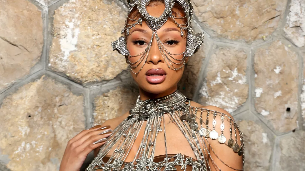 Megan Thee Stallion's Reverse Stiletto Nails at Paris Fashion Week Are Breaking the Internet