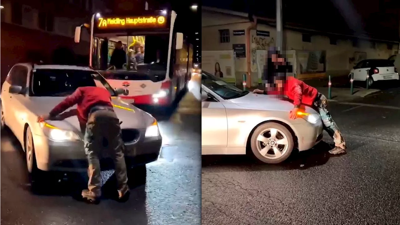 verletzter Mann liegt vor BMW-Fahrer in Wien-Favoriten