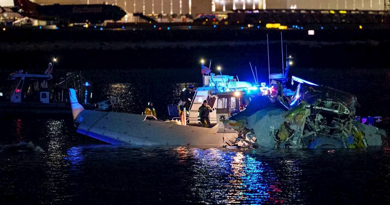 Passenger jet and Army helicopter crash into Potomac River near Washington DC