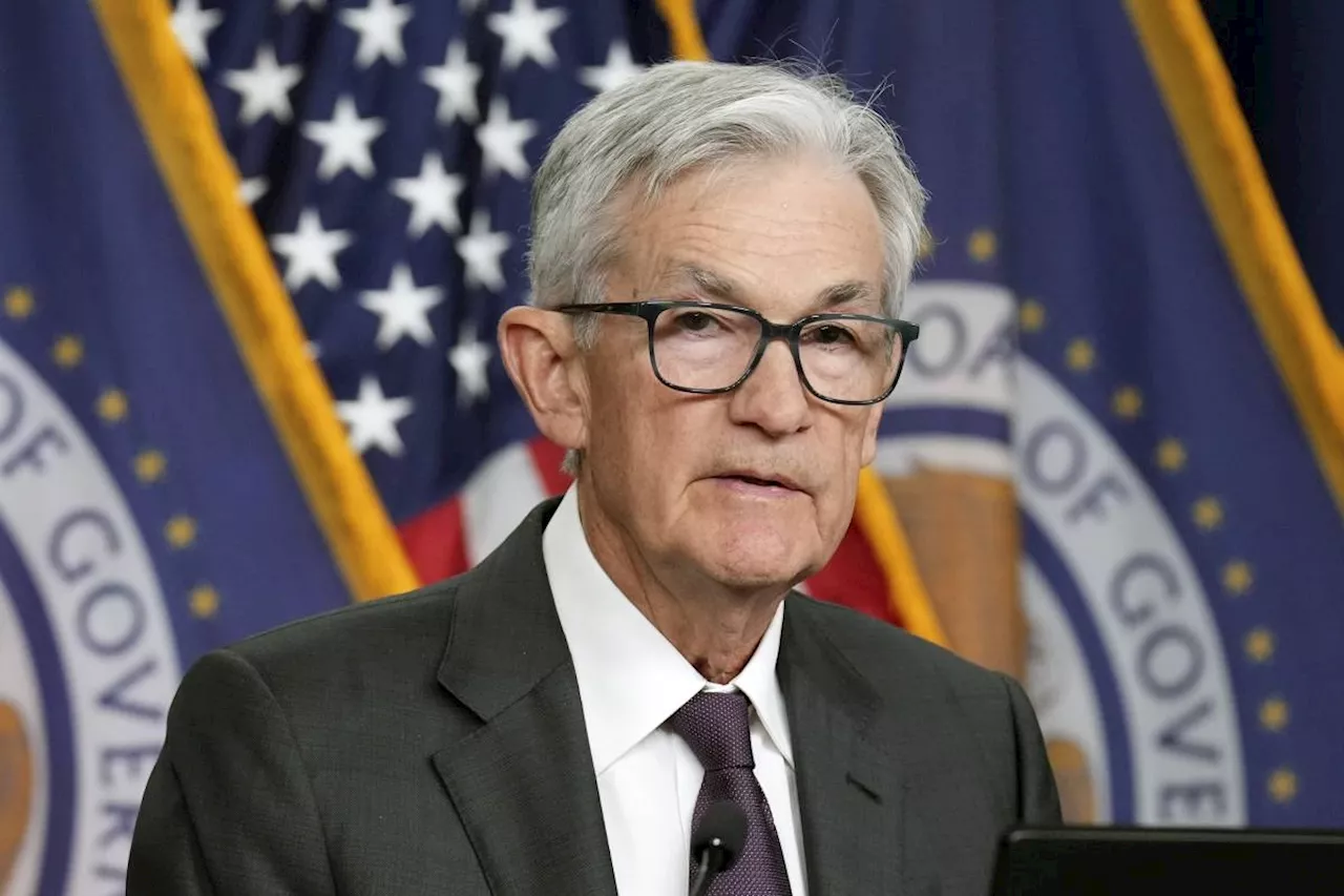 Fed hold rates steady, sees inflation as 'elevated,' as Powell declines comment on Trump