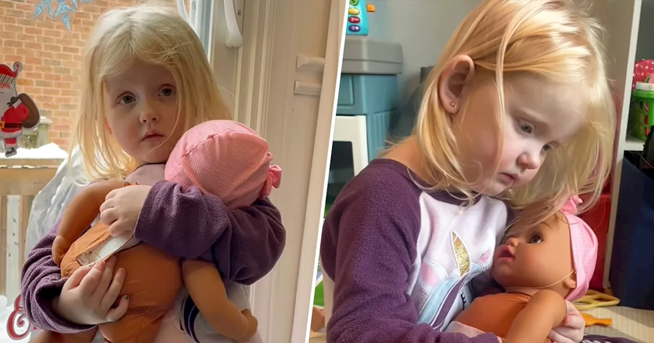 Toddler's Hilarious Struggle With a Crying Baby Doll Goes Viral