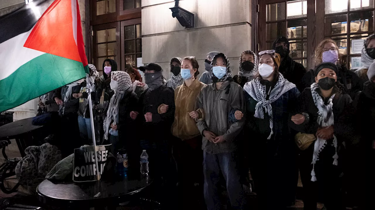 Pro-Palestinian Students Brace for NYPD Raid at Columbia University as Trump Signs Executive Order Against Anti-Semitism