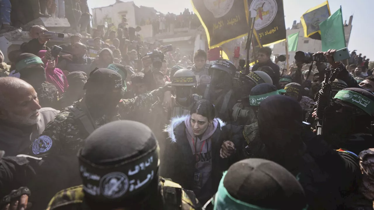 AP photos capture a day of wrenching emotion as Israel and Hamas release hostages and prisoners