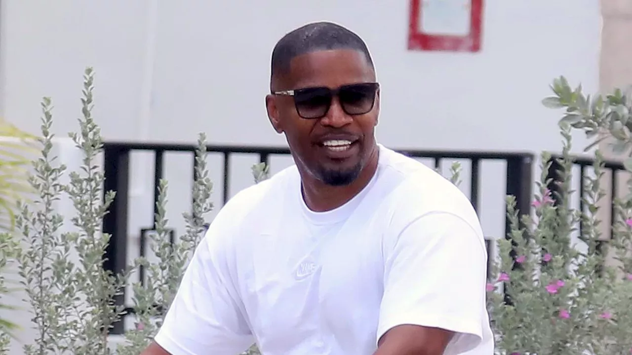 Jamie Foxx flashes smile as he enjoys a bike ride in Miami following split from girlfriend Alyce...