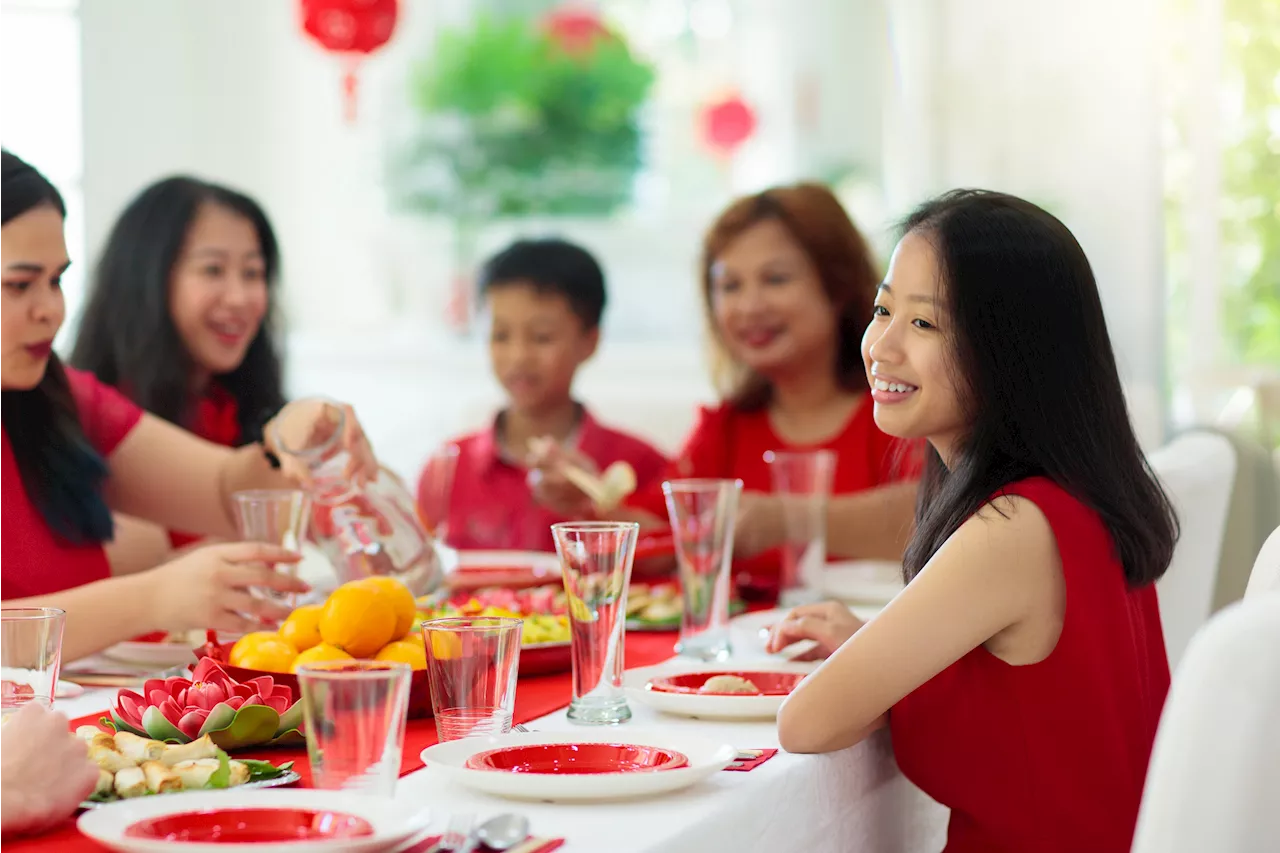 Singaporean Woman Sparks Debate By Asking Husband To Change All-Black Outfit For Family CNY Gathering