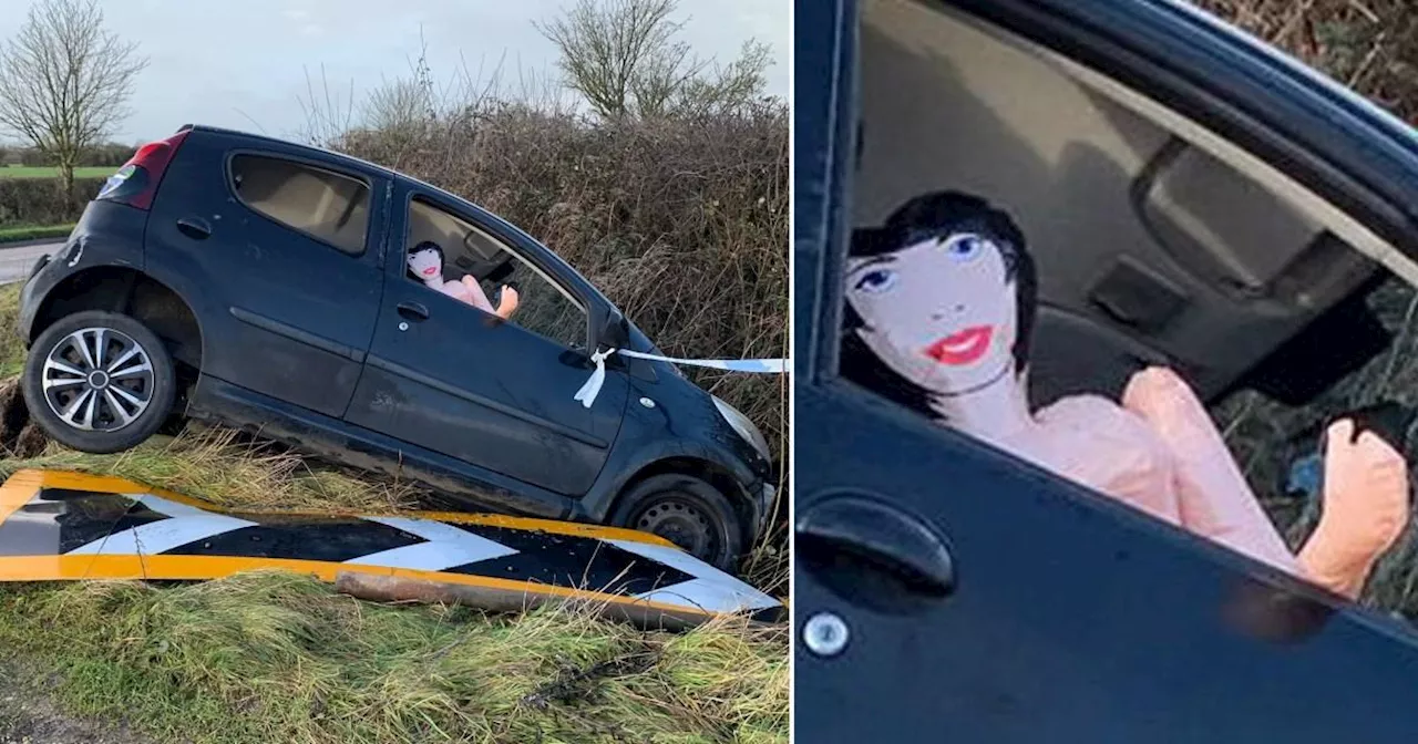 Car abandoned at scene of crash with unusual driver still in the front seat