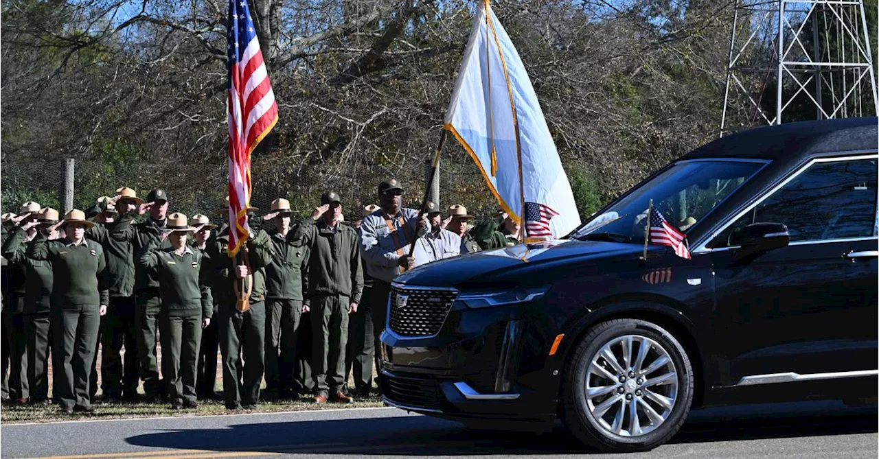 Tributes Paid to Former President Jimmy Carter as Casket Makes its Way Through Georgia