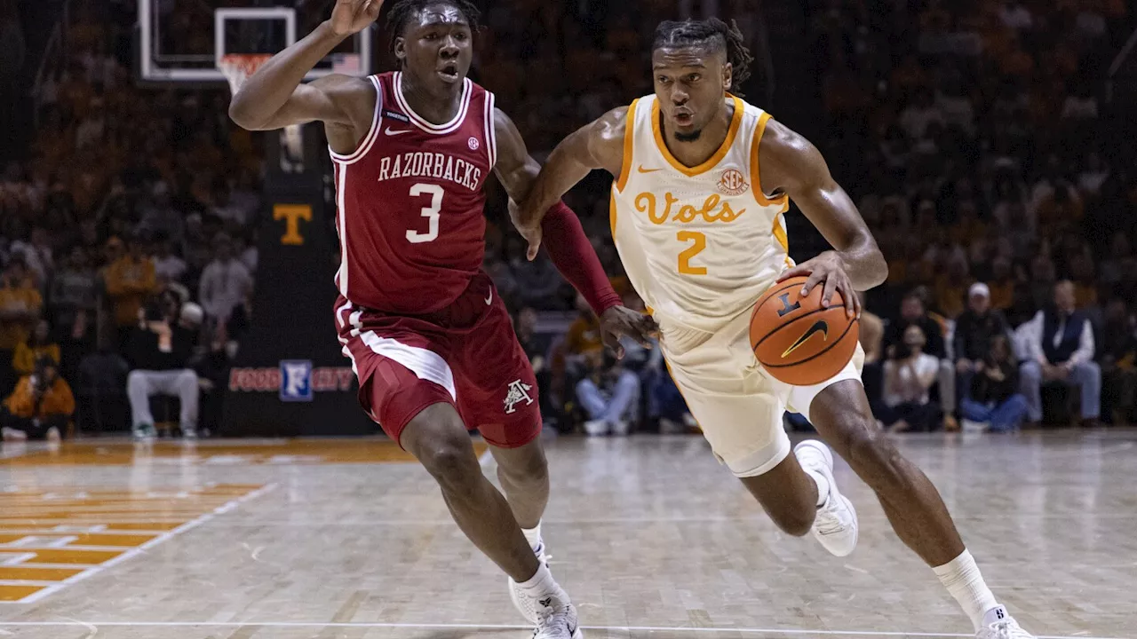 No. 1 Tennessee beats No. 23 Arkansas 76-52 to match best start in program history