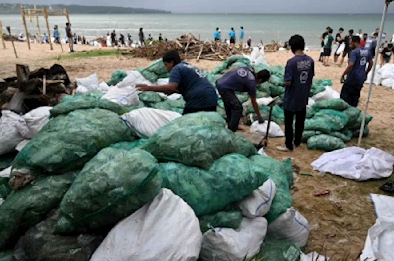 Hundreds of volunteers join cleanup effort as Bali faces ‘worst’ plastic waste from monsoons