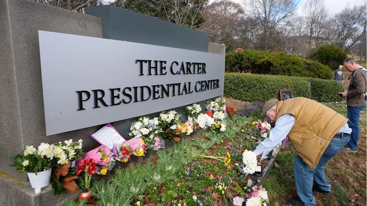 Funeral Procession Honors Carter's Roots in Plains, Georgia