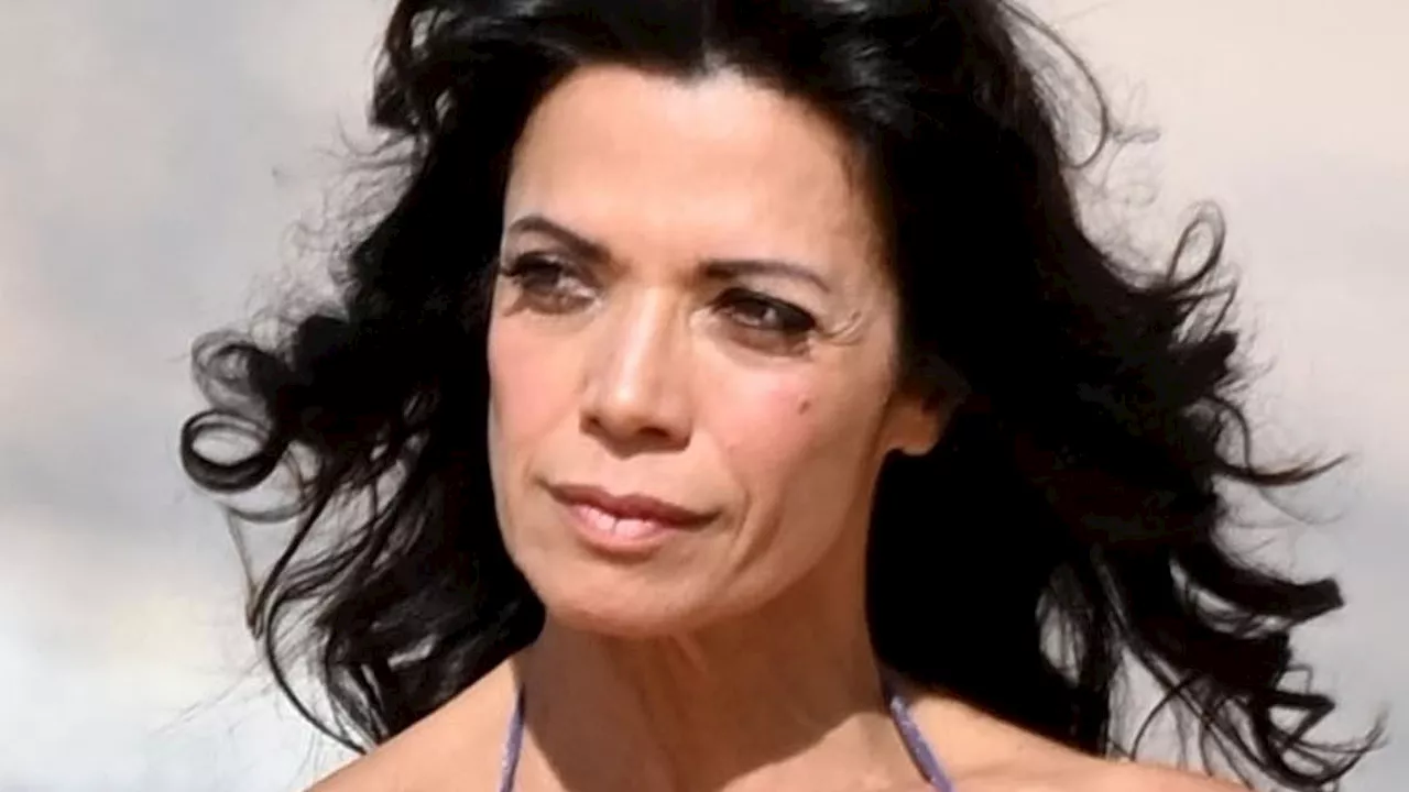 Jenny Powell Flaunts Figure in Purple Bikini During Morocco Getaway