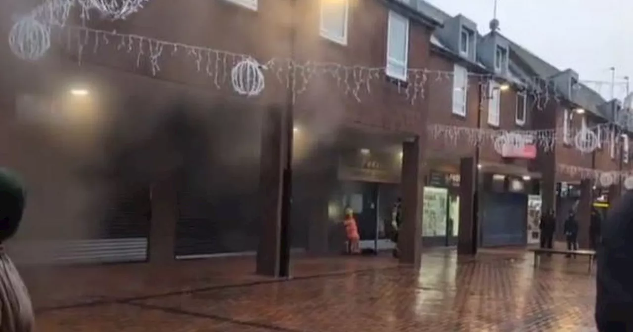 LIVE Emergency crews swarm shopping centre as smoke billows from popular café