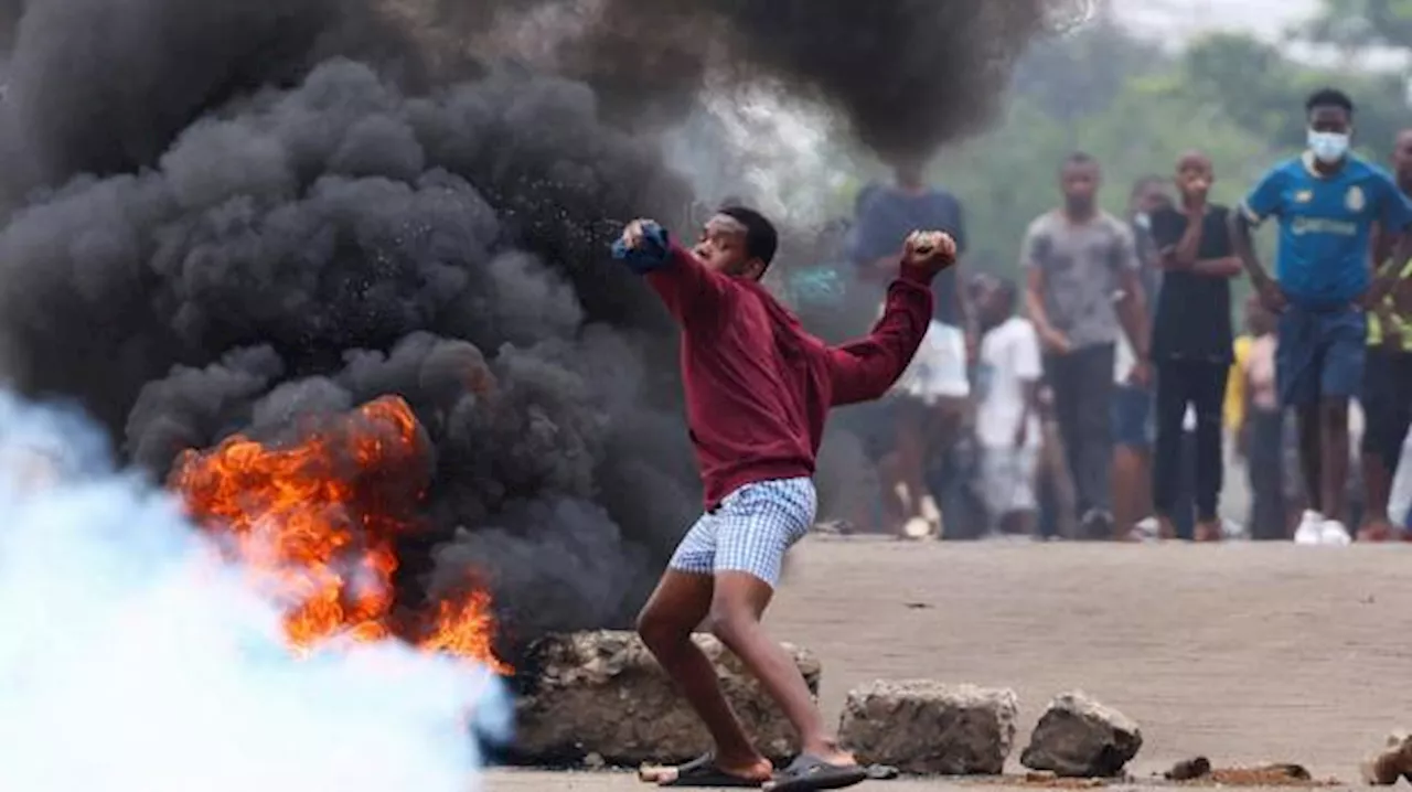 Mozambiques oppositionsleder vender hjem efter dødbringende protester