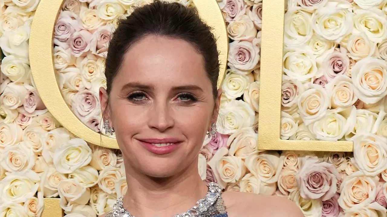 Felicity Jones Stuns at Golden Globes in Silver Gown