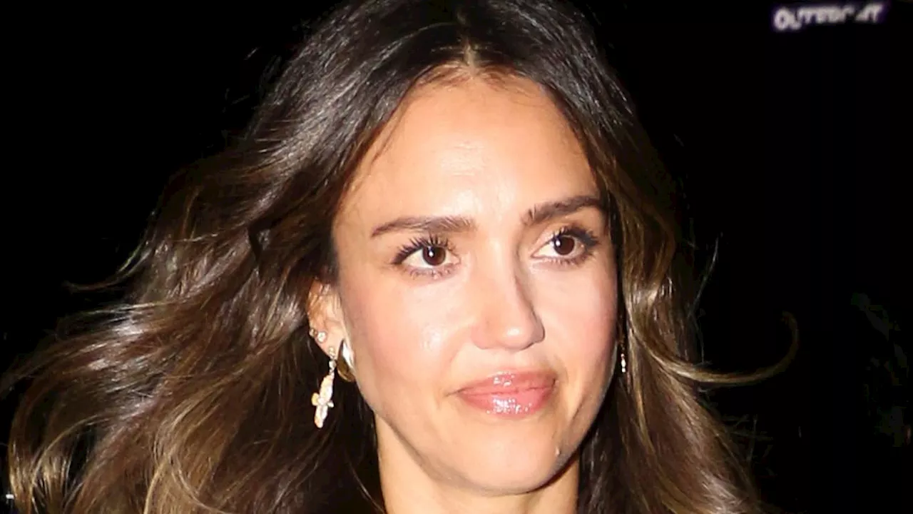 Jessica Alba seen without wedding ring at LA party after sharing family photo with husband Cash...