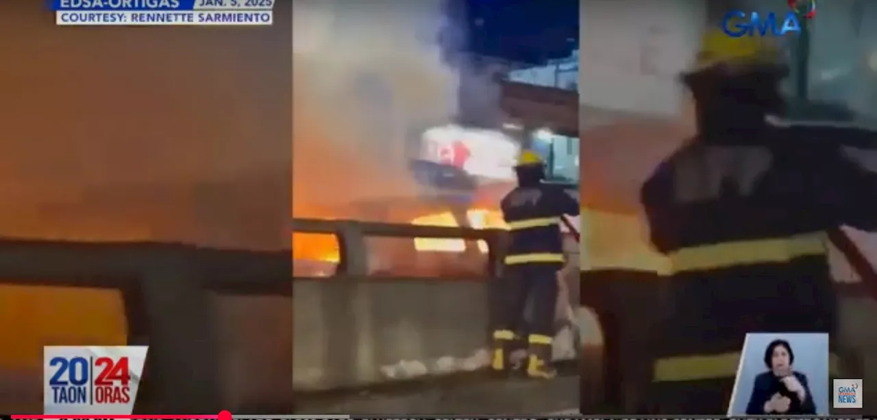 Car catches fire on EDSA-Ortigas Flyover