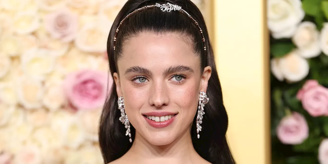 Margaret Qualley Radiates at the Golden Globes in Ethereal White Gown