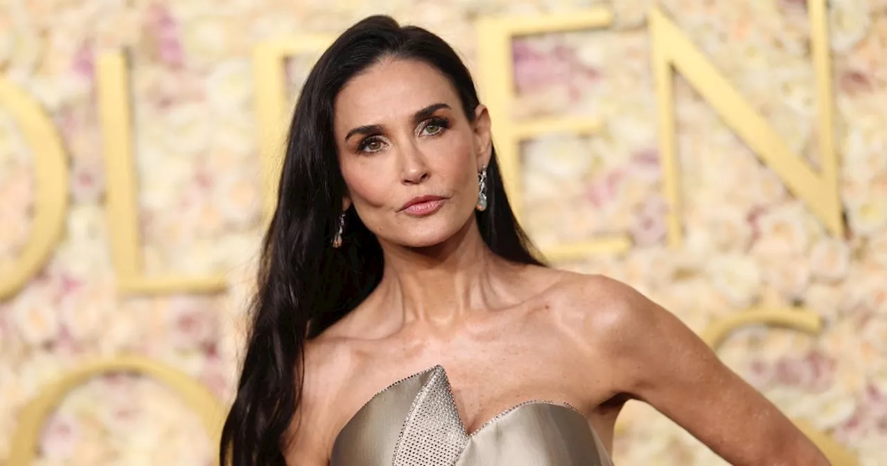 Demi Moore Walks to Golden Globes, Stuns in Bedazzled Gown