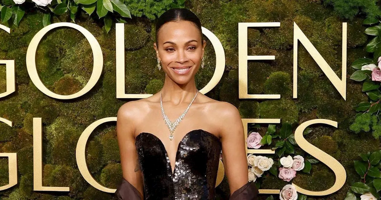 Zoe Saldana's Golden Globes Glow: The Secret Gadget Revealed