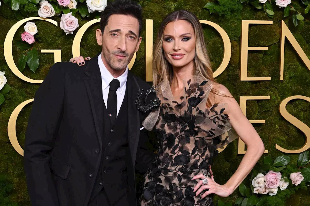 Adrien Brody and Georgina Chapman Coordinate in Chic Black Looks at the Golden Globes