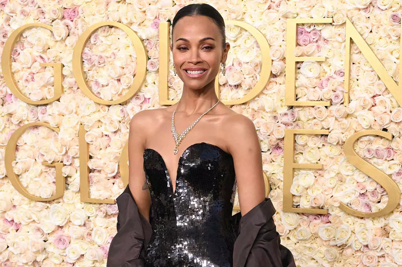 Zoe Saldaña Shines at the 2025 Golden Globes in a Sequin Brown Gown and Diamonds