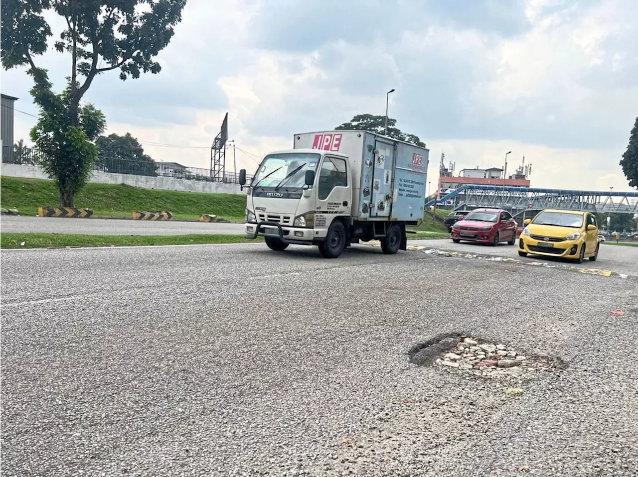 Balakong residential road ruined by heavy vehicles