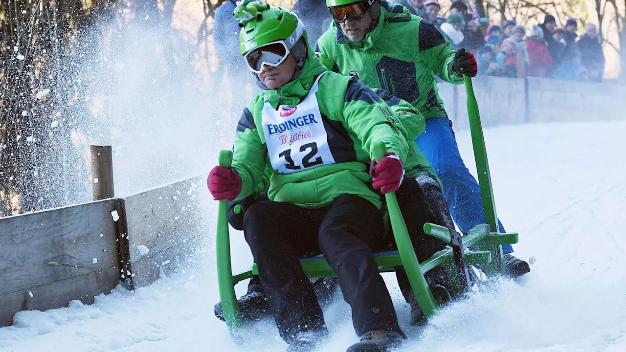 Prominente Sportler beim Hornschlittenrennen in Garmisch-Partenkirchen