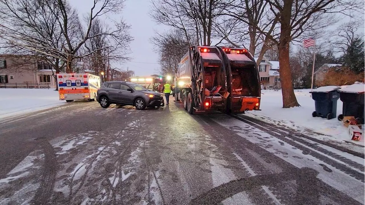 SUV Strikes Garbage Truck, Injuring Workers in Batavia