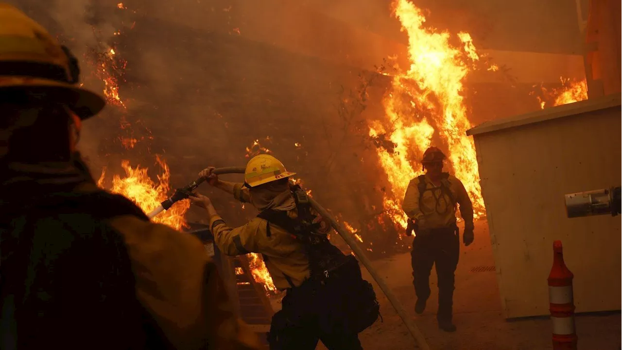 Wildfire Threatens Homes in Los Angeles as Powerful Windstorm Hits