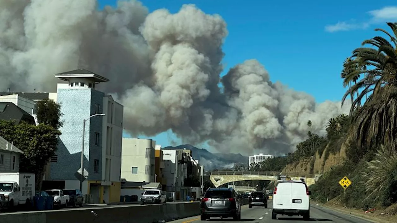 Wildfire Rages in Pacific Palisades, Forcing Evacuations