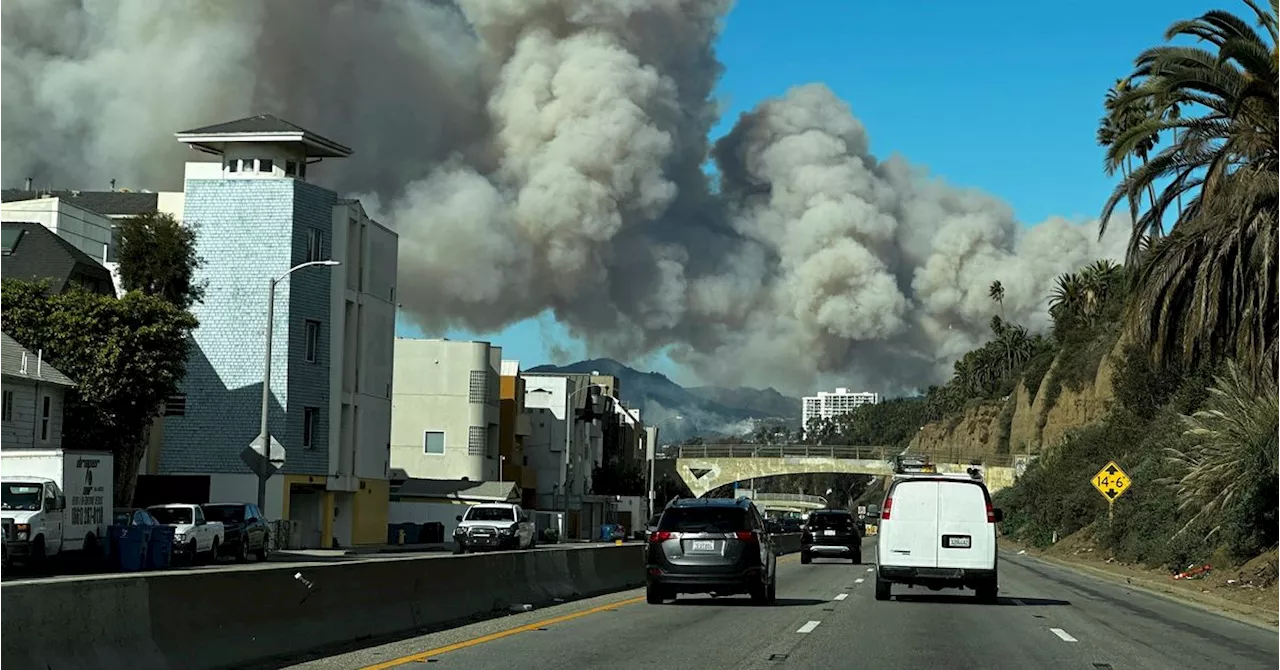 Wildfires Rage in Los Angeles as Strong Winds Fuel Blazes