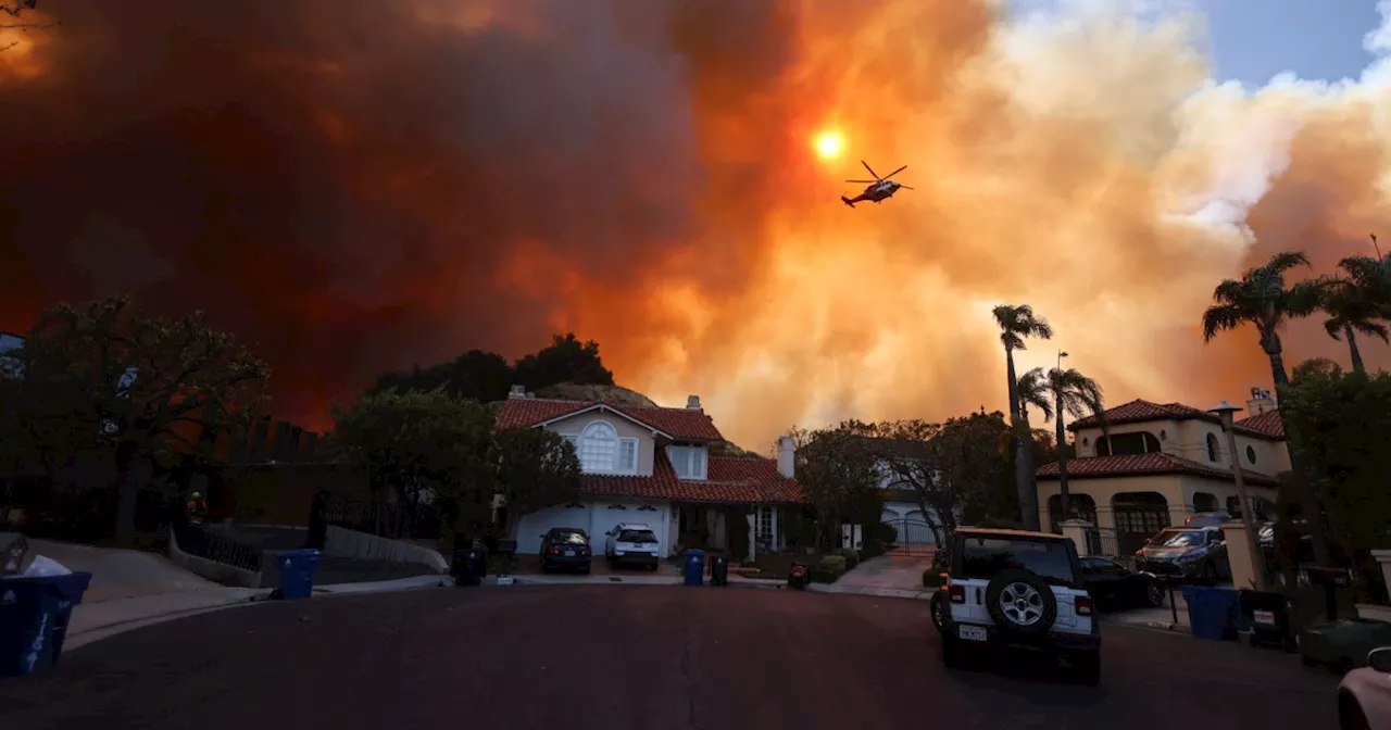 Palisades Fire Forces Evacuations as Strong Winds Fan Flames