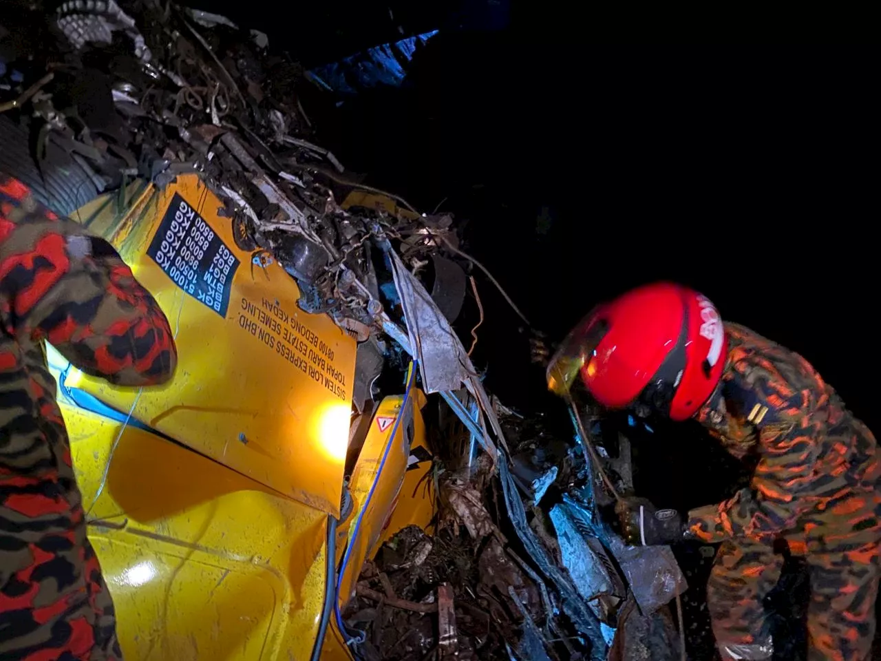 Truck Carrying Iron Cargo Plunges Into 20-Meter Gorge in Bentong