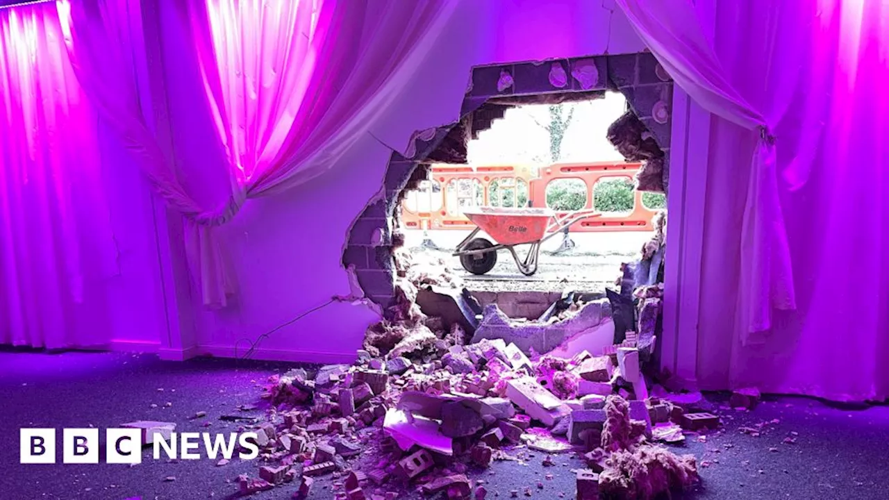 Car Crashes Into Events Hall, Leaving Large Hole