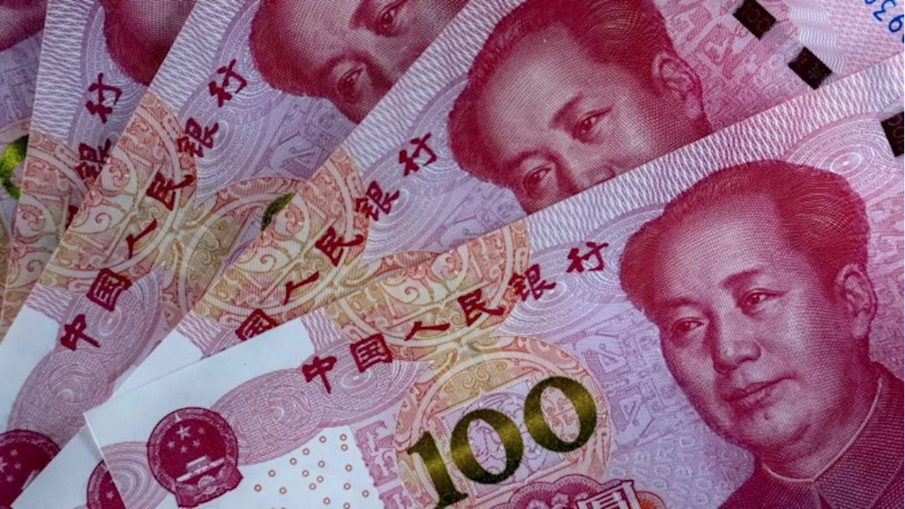 China’s Currency Weakens Amid US Economic Strength and Tariff Fears