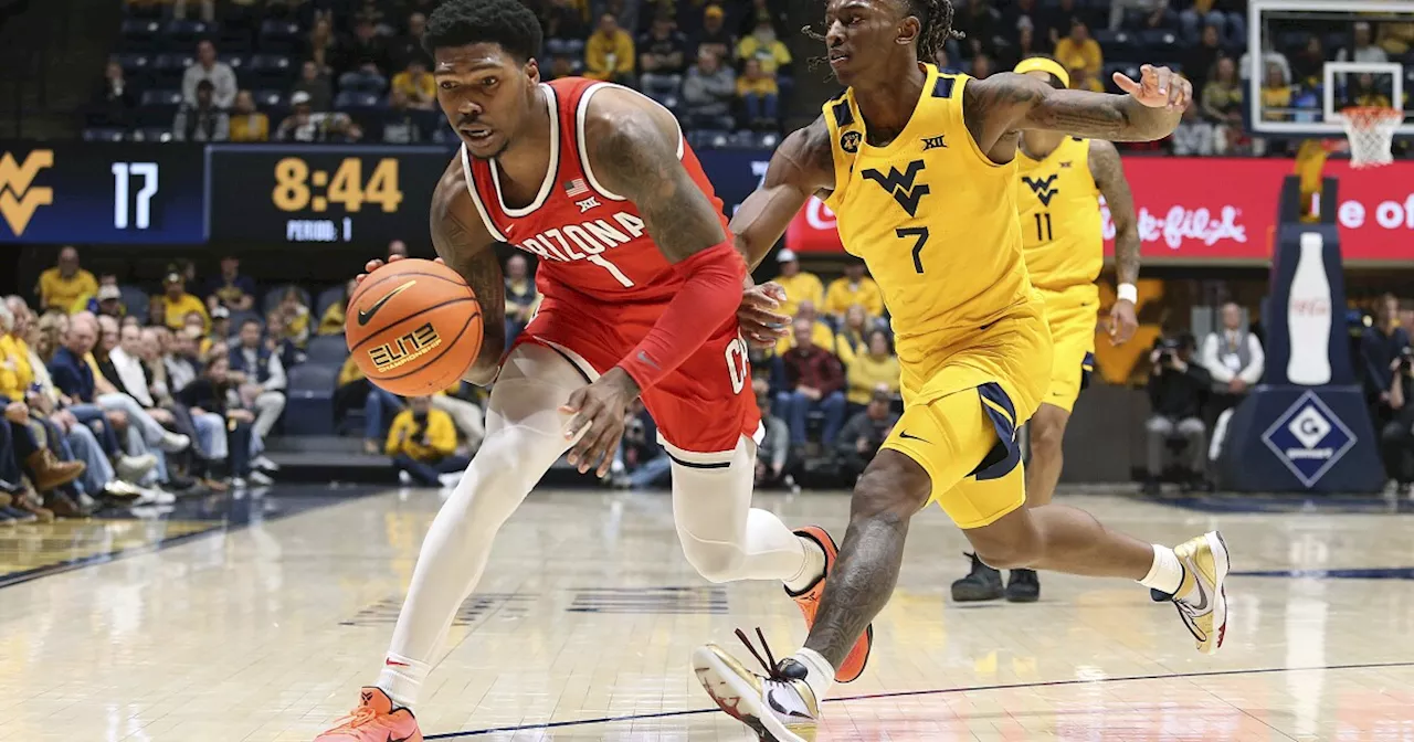 KJ Lewis scores career-high 21 as Arizona beats No. 21 West Virginia 75-56