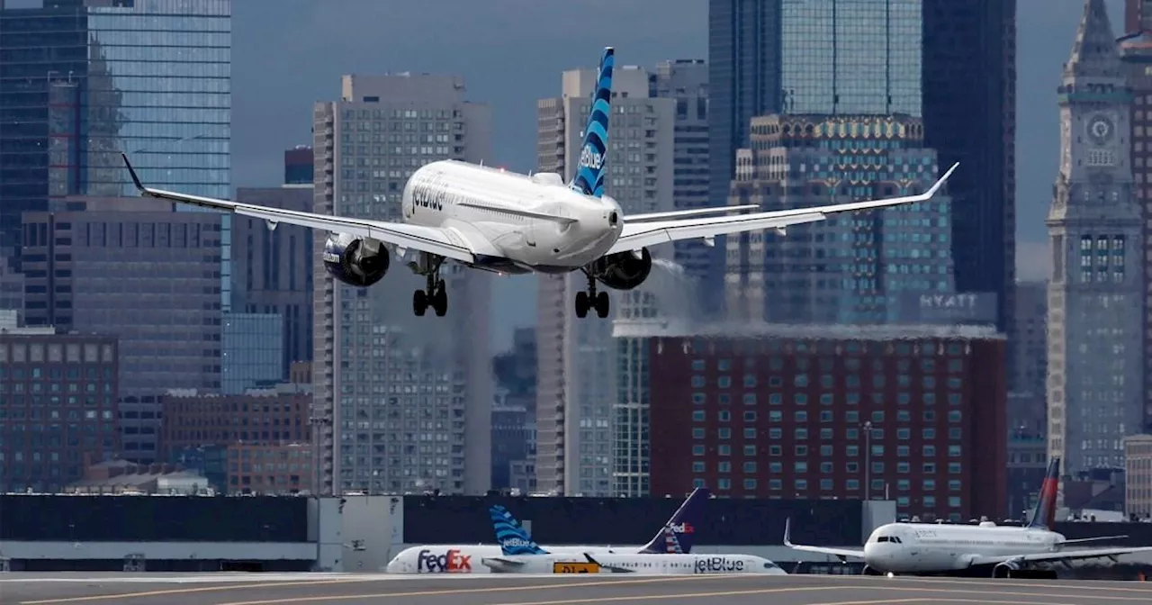 Passenger Opens Plane Door on Taxiway at Boston Airport