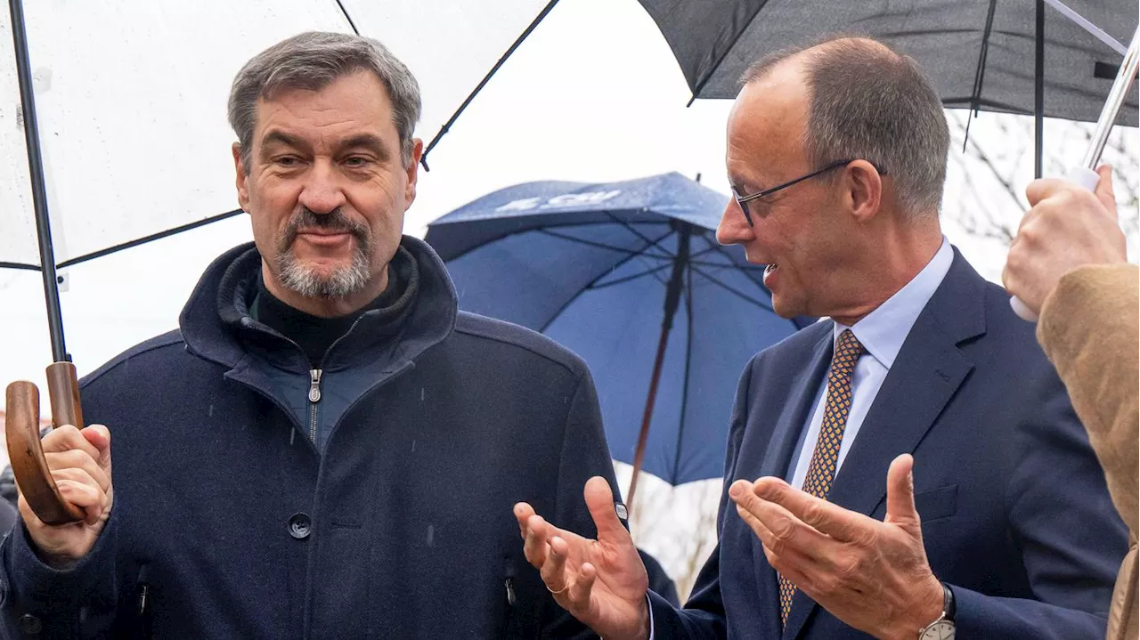 Wahlkampfauftakt von CDU und CSU: Söder steht im Regen – und trotzdem irgendwie zu Merz