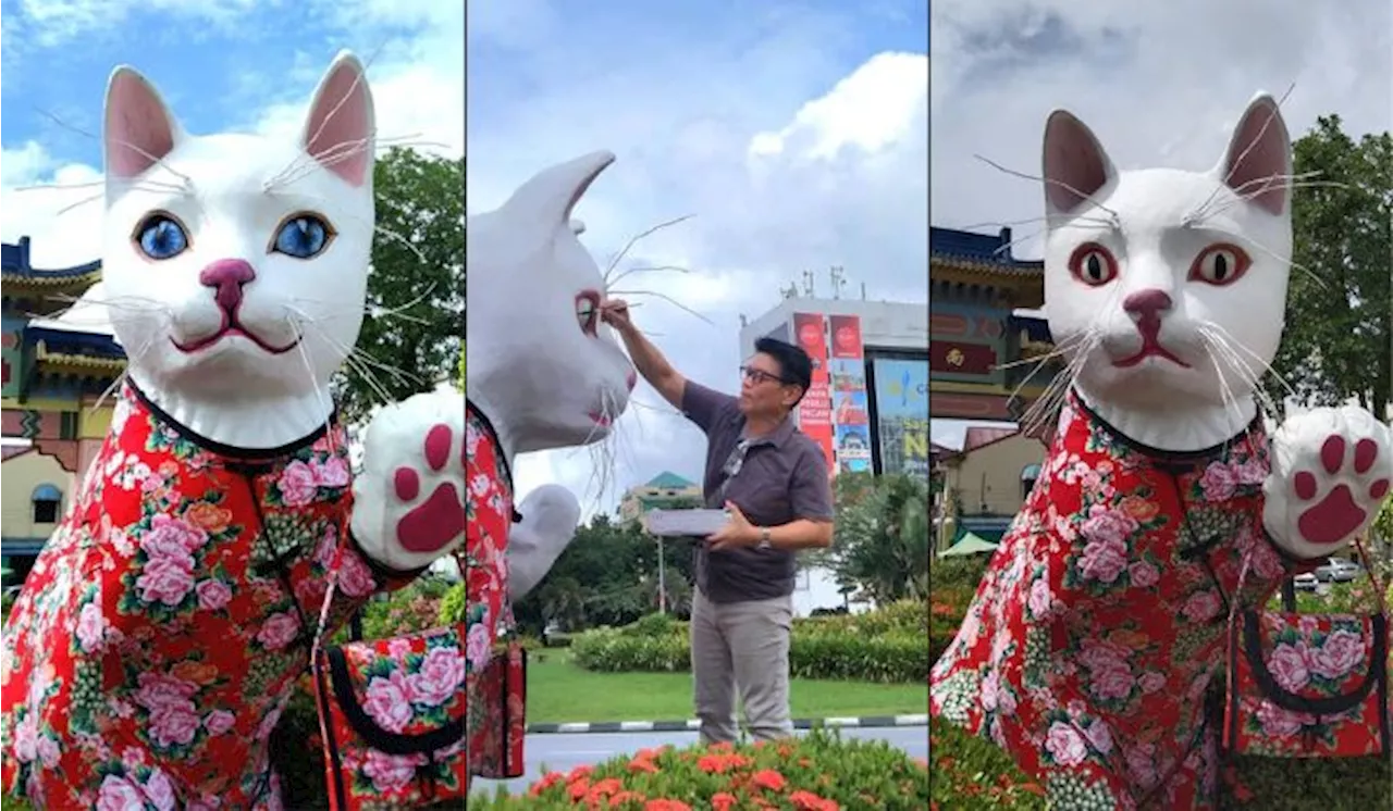 Artist Repaints Cat Statue in Kuching, Giving it a 'True Blue Vision'