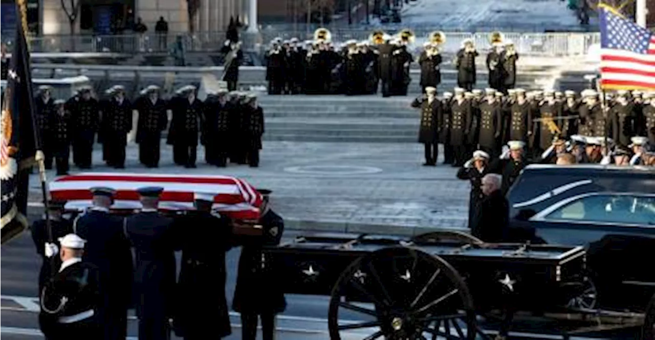 Carter’s body arrives in Washington for State Funeral